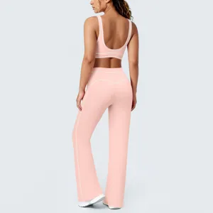 Set duetto reggiseno sportivo contrasto e pantaloni yoga a zampa rosa fitness