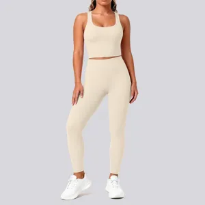 Solid color nude feel sports bra and yoga leggings two-piece set, breathable fitness activewear.