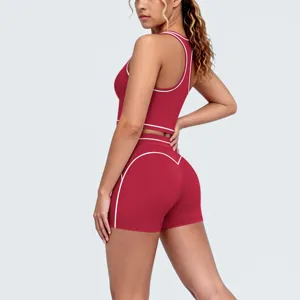 Side and back view of a burgundy contrast piped activewear yoga set with racerback design.