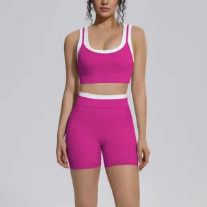 Women two-piece activewear set color-block sports bra and high-waist yoga shorts for fitness.