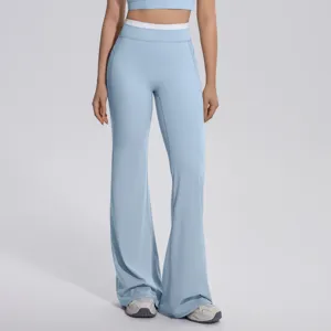 Vue détaillée pantalon de yoga femme taille haute, tissu doux et jambes évasées confort.