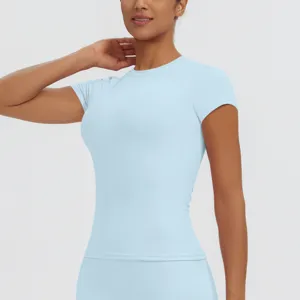 Detailed close-up of a light blue short sleeve athletic top, showcasing soft stretch fabric.