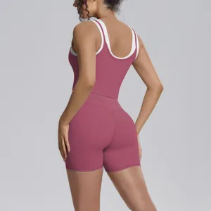 Women contrast layered tank top and tight shorts yoga set for running fitness workout apparel.