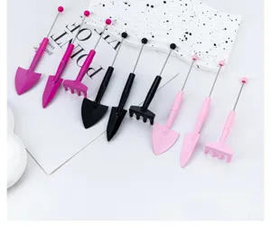 Mini succulent gardening tool set with cute beaded handle detail, perfect for small potted plants.
