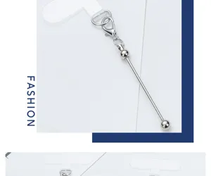 Metal phone charm strap accessory detail view, universal tether tab connector piece replacement.