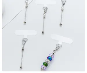 Transparent DIY phone tether tab with metal bead chains, sturdy universal phone case patch.