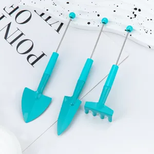 Miniature gardening tool set including shovel, trowel and rake for succulent potted plants.