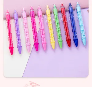 Close-up detail of colorful maze ballpoint pens with clear barrels and rolling steel balls.