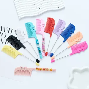 Colorful plastic bow fine tooth hair comb with DIY beaded metal pick handle for styling.