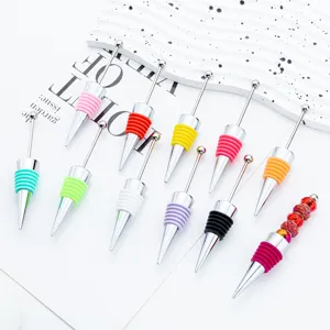 Tappi per bottiglie di vino in silicone e lega con design di perline fai da te.