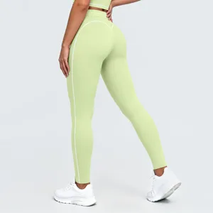 Mallas de yoga de talle alto para mujer con ribetes en contraste para fitness y correr.