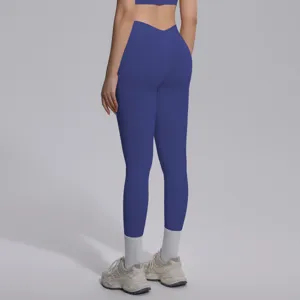 Seamless solid blue high waist yoga leggings and sports bra set for women fitness running gym.