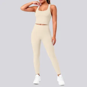 Close-up detail of women's seamless beige athletic yoga set, featuring a cropped top and leggings.
