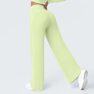 High-waisted wide-leg yoga pants detail view, light green athletic trousers back fit.
