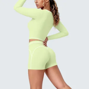 Lime green long sleeve crop top and shorts activewear set, perfect for yoga and fitness workouts.