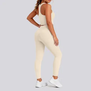 Solid color seamless yoga set detail view, athletic ribbed crop top and high waist leggings.