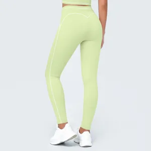 Leggins de yoga verdes de talle alto con costuras blancas en contraste para mujer fitness