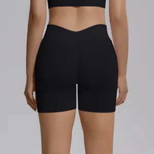 Back detail view of black seamless V-waist high-rise yoga fitness shorts, breathable fit.