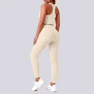 Seamless solid color yoga set detail view featuring backless sports bra and leggings.