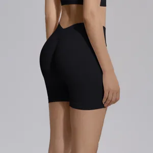 Detail shot of seamless knit high waist v-waist butt lifting athletic fitness yoga shorts.