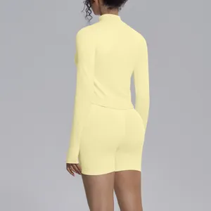 Women light yellow long sleeve activewear crop top and shorts seamless yoga set fitness gym