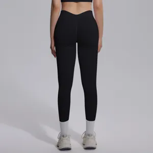 Detail view of high-waist seamless black yoga leggings showcasing back contour and fit.