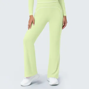 Detailed view of light green high-waist flare yoga pants with contrast white piping seams.