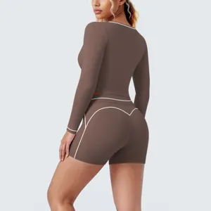 Brown long sleeve crop top and shorts activewear set for yoga, fitness and running workouts.