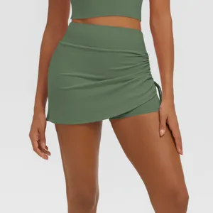 Green high-waisted ruched athletic skort gym fitness yoga workout running shorts for women
