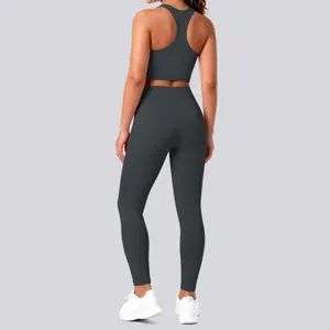 Seamless solid color backless yoga top and high waist leggings detail view for fitness.