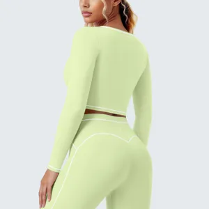 Sport crop top met lange mouwen en leggings set, ademende hoge stretch fitness yoga kleding.