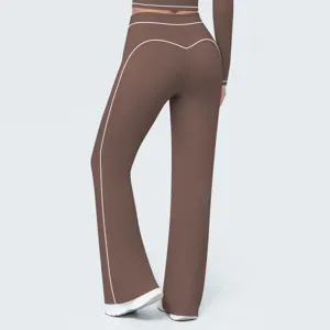 Detailed view of women's high-waisted contrast piping flare yoga pants for sports and fitness.
