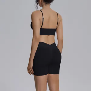Conjunto deportivo sin costuras liso mujer transpirable elastico pantalones cortos de yoga y top.