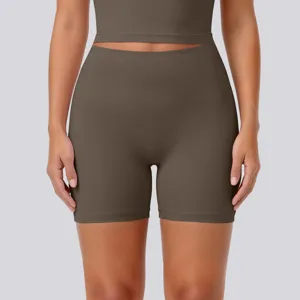 High waist athletic yoga shorts in dark brown, offering stretchy comfort for workouts.