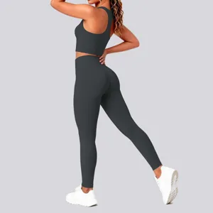 Back view detail of solid color sports bra and tight yoga leggings fitness two-piece set.