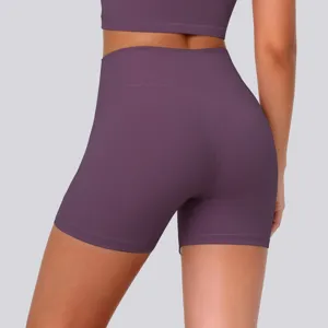 Detail view of high-waisted purple yoga shorts, offering flexible fit and breathable comfort.