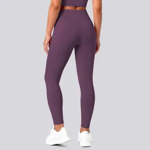 Back view detail of high waist fitness yoga leggings in solid purple color for workout.