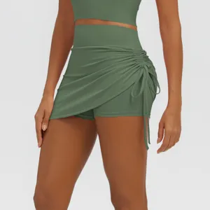 High-waisted ruched yoga skirt shorts, breathable fitness activewear for running and gym workout.