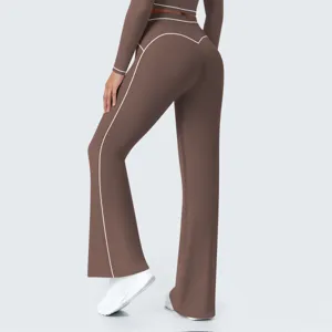 Brown high waist flare yoga pants with white contrast piping, activewear fitness leggings.