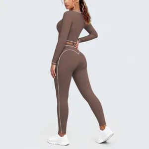 Brown long sleeve crop top and leggings yoga set, contrast piping activewear for fitness running.