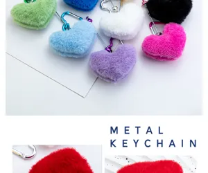 Fluffy heart keychain plush charm with metal carabiner hook for bags and keys assortment.