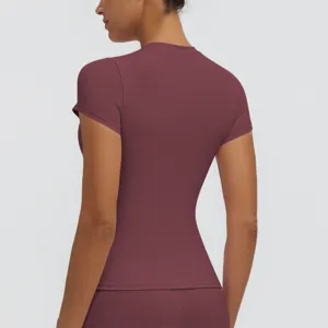 Slim fit short sleeve yoga top athletic running shirt for women back detail view.