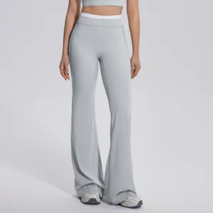 Pantalon de yoga flare taille haute pour femme avec double ceinture faux deux pièces sport.