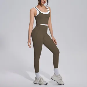 Detailed view of the contrast color ribbed tank top and high-waist yoga pants activewear set.