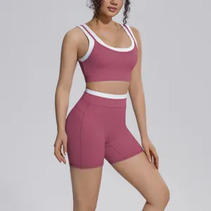 Detailed view of the contrast trim sports bra and high-waist fitness yoga shorts set.