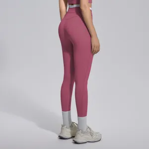 Vue détaillée du legging de yoga à taille haute avec ceinture contrastée pour le sport.