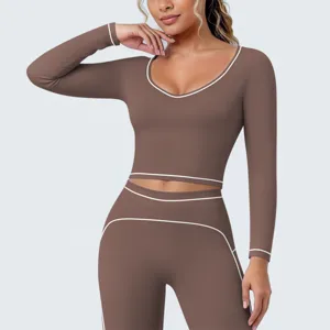 Dames sport top met lange mouwen en hoge taille yoga legging contrast bies set