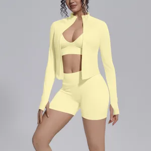 Seamless solid color 3-piece activewear set, featuring zip jacket, sports bra, and shorts.
