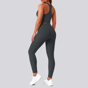 Charcoal grey seamless nude-feel athletic yoga set backless sports bra and leggings detail.
