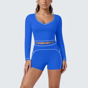 Women blue long sleeve crop top and shorts yoga set activewear fitness sportswear outfit